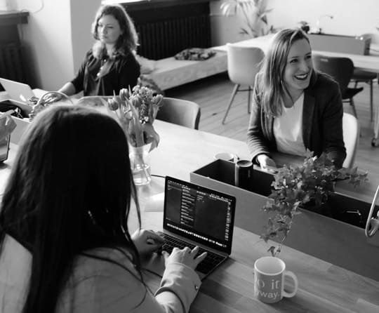 office workers sat at a desk